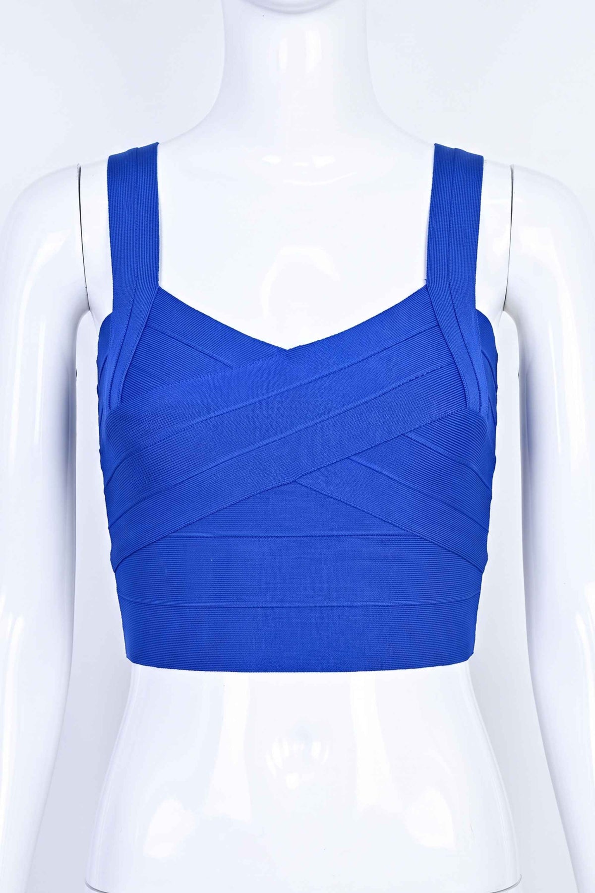 Woman wearing a figure flattering Jay Bandage Crop Top - Royal Blue BODYCON COLLECTION