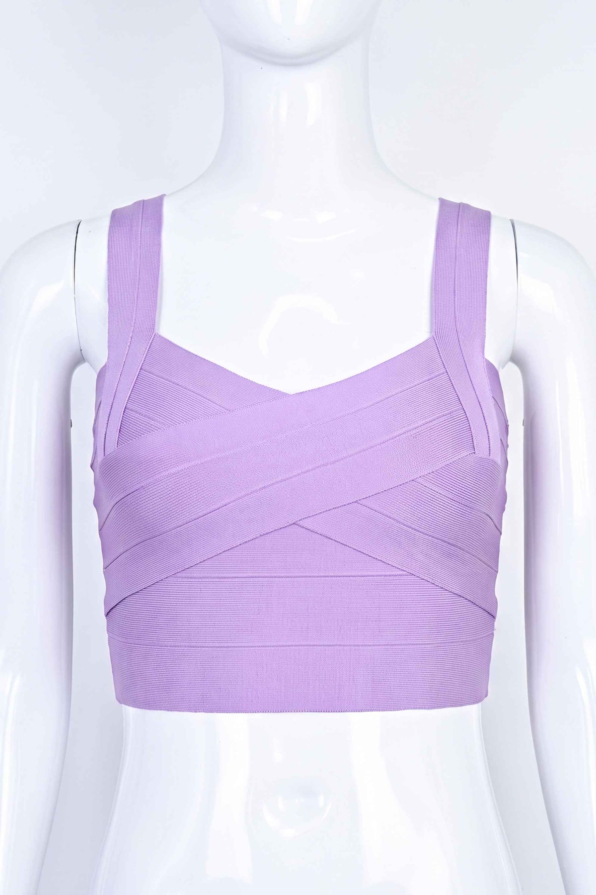 Woman wearing a figure flattering Jay Bandage Crop Top - Violet Purple BODYCON COLLECTION
