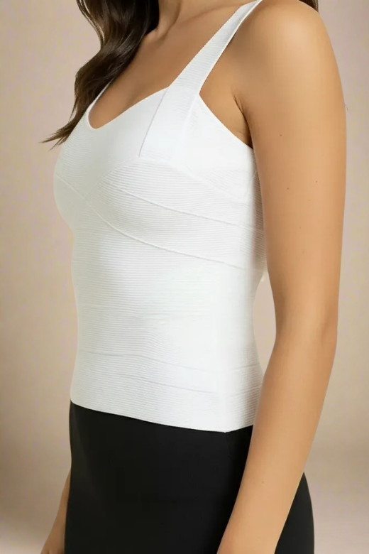 Woman wearing a figure flattering Jay Bandage Top - Pearl White BODYCON COLLECTION