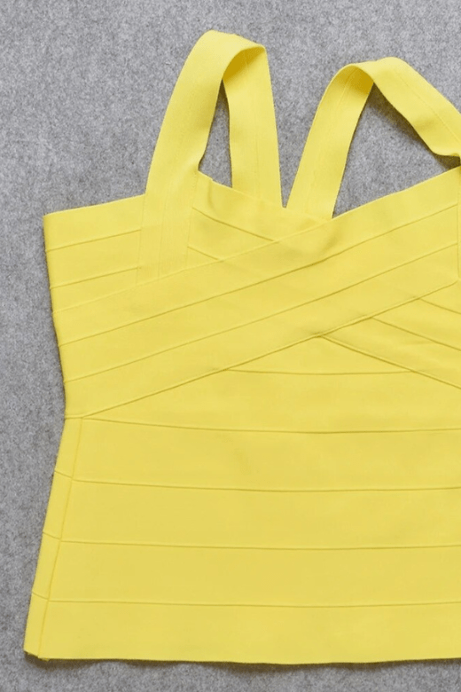 Woman wearing a figure flattering Jay Bandage Top - Sun Yellow BODYCON COLLECTION