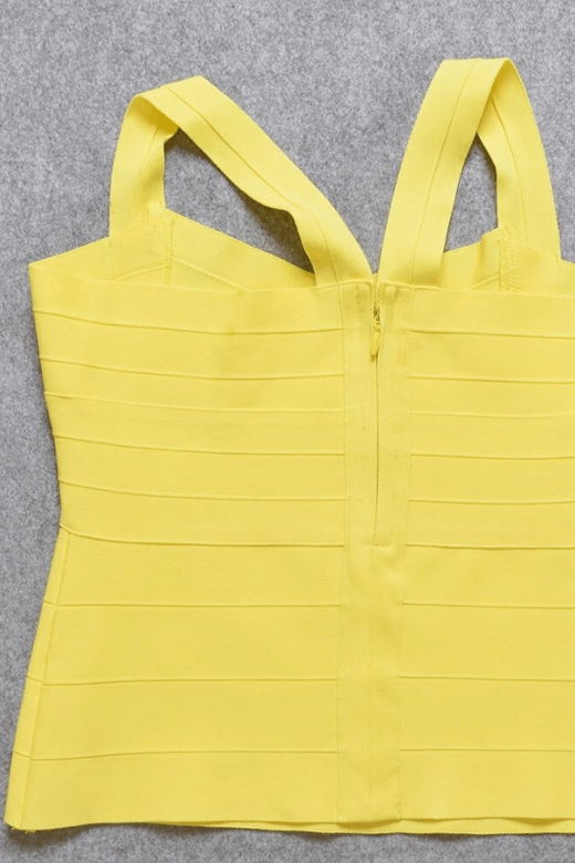 Woman wearing a figure flattering Jay Bandage Top - Sun Yellow BODYCON COLLECTION