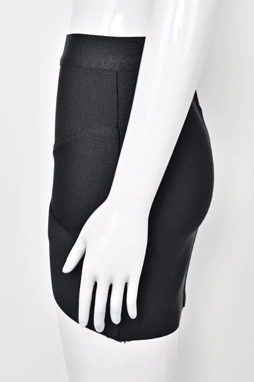 Woman wearing a figure flattering Jay High Waist Bandage Mini Skirt - Classic Black BODYCON COLLECTION