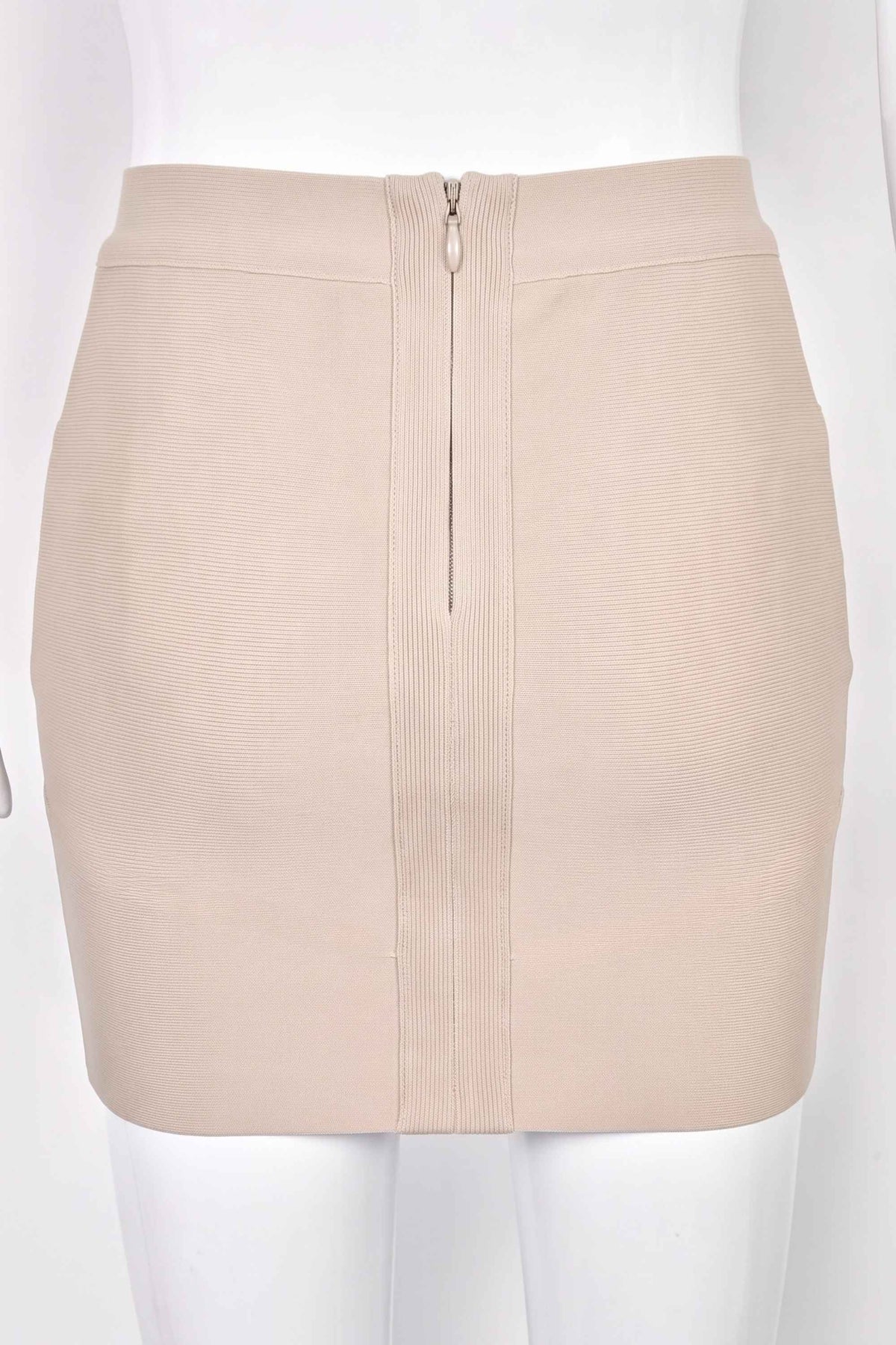 Woman wearing a figure flattering Jay High Waist Bandage Mini Skirt - Cream BODYCON COLLECTION
