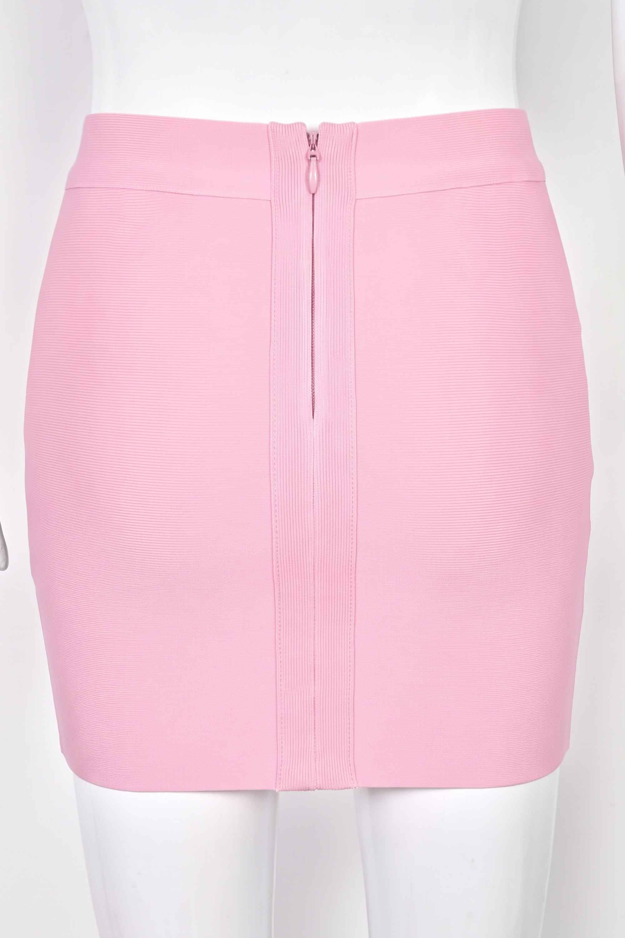 Woman wearing a figure flattering Jay High Waist Bandage Mini Skirt - Dusty Pink BODYCON COLLECTION