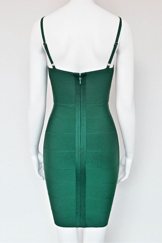 Woman wearing a figure flattering Jene Bandage Dress - Emerald Green BODYCON COLLECTION