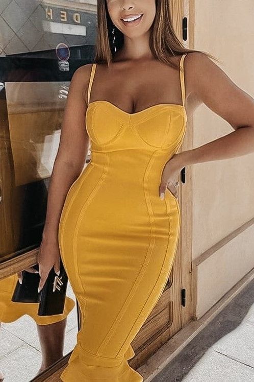 Woman wearing a figure flattering Joy Bandage Midi Dress - Pearl White Bodycon Collection