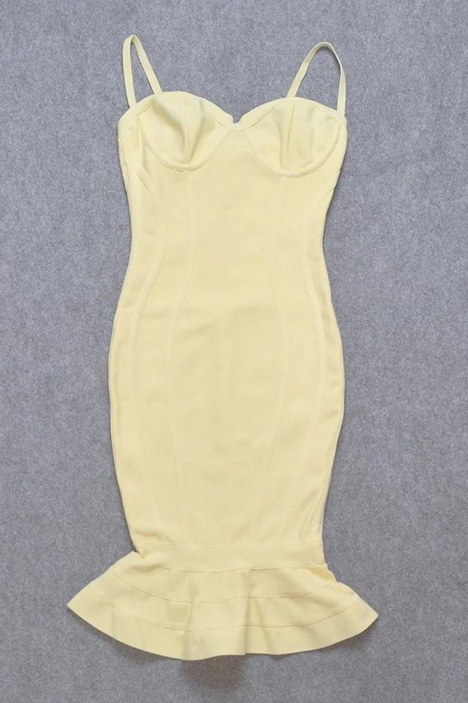 Woman wearing a figure flattering Joy Bandage Midi Dress - Sun Yellow Bodycon Collection