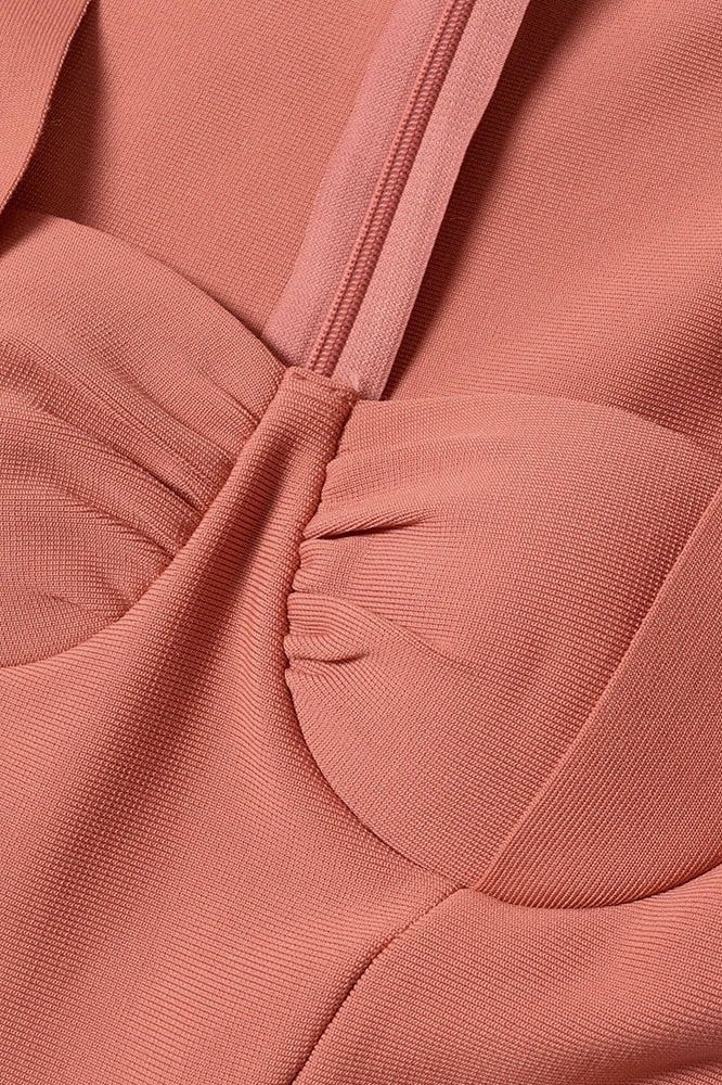 Woman wearing a figure flattering Jules Long Sleeve Midi Bandage Dress - Watermelon Pink BODYCON COLLECTION
