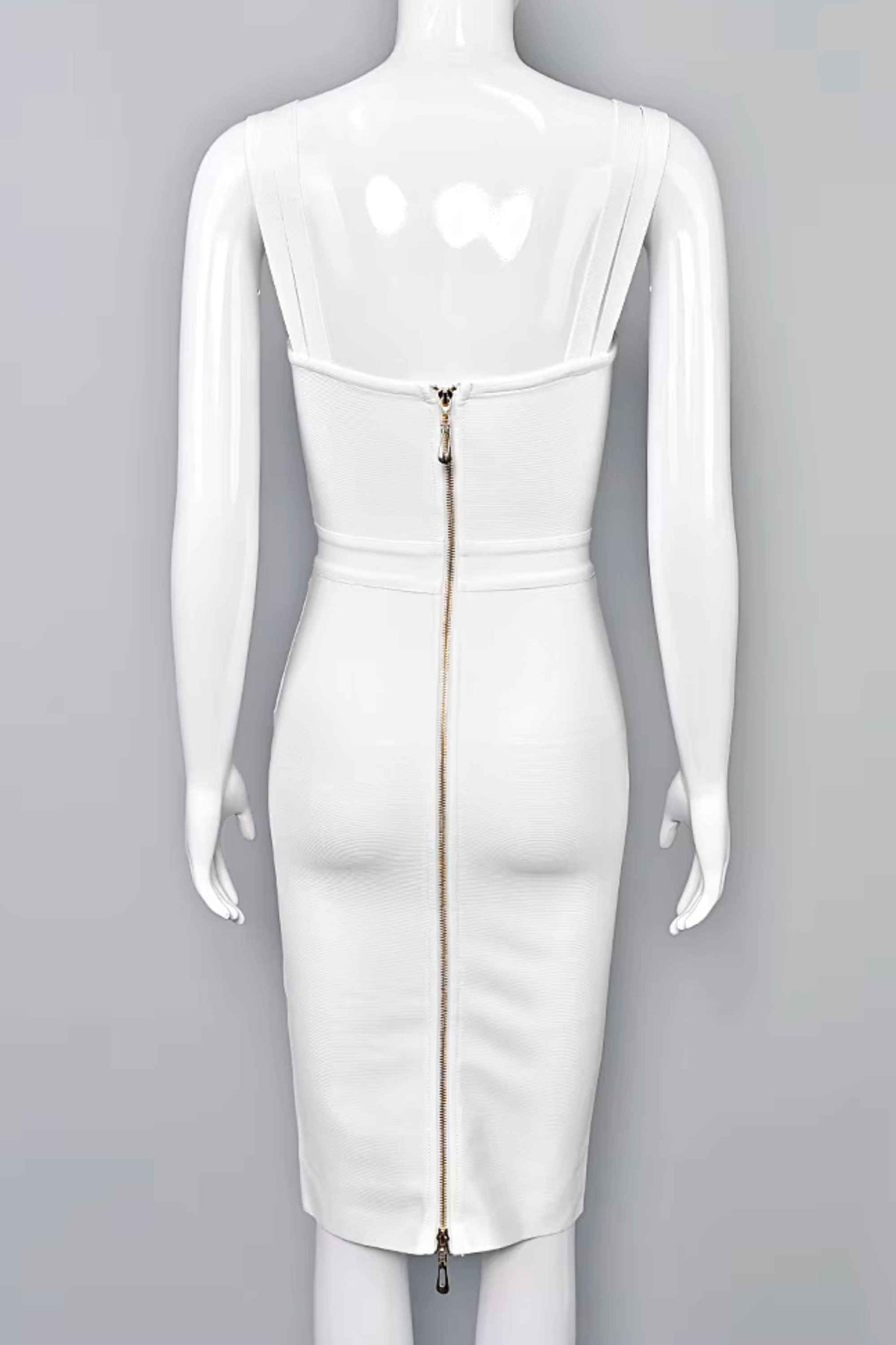 Woman wearing a figure flattering Kate Bandage Dress - Pearl White Bodycon Collection