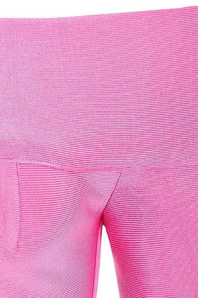 Woman wearing a figure flattering Kelly Long Sleeve Bandage Dress - Hot Pink BODYCON COLLECTION