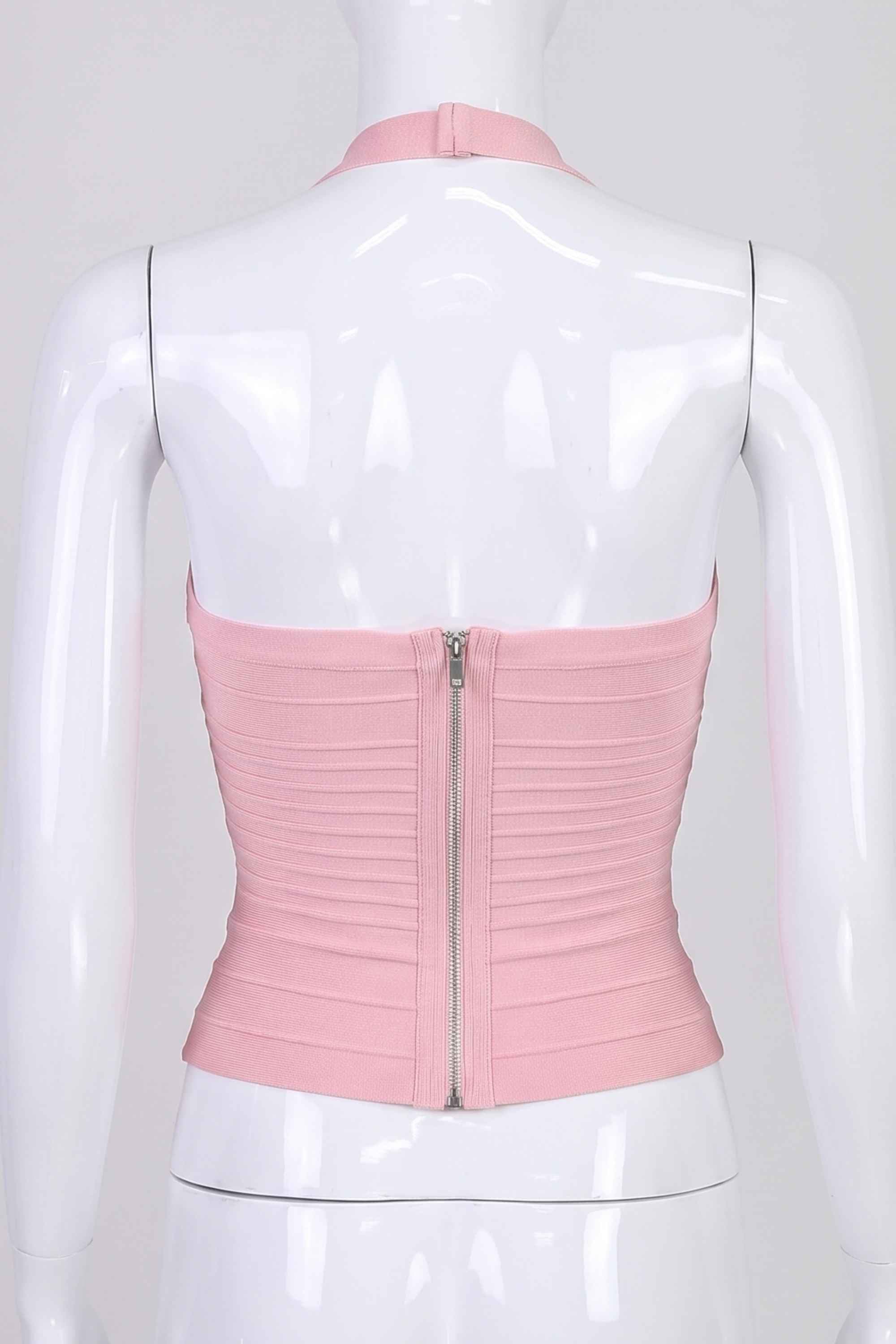 Woman wearing a figure flattering Kia Bandage Top - Dusty Pink BODYCON COLLECTION Pty Ltd