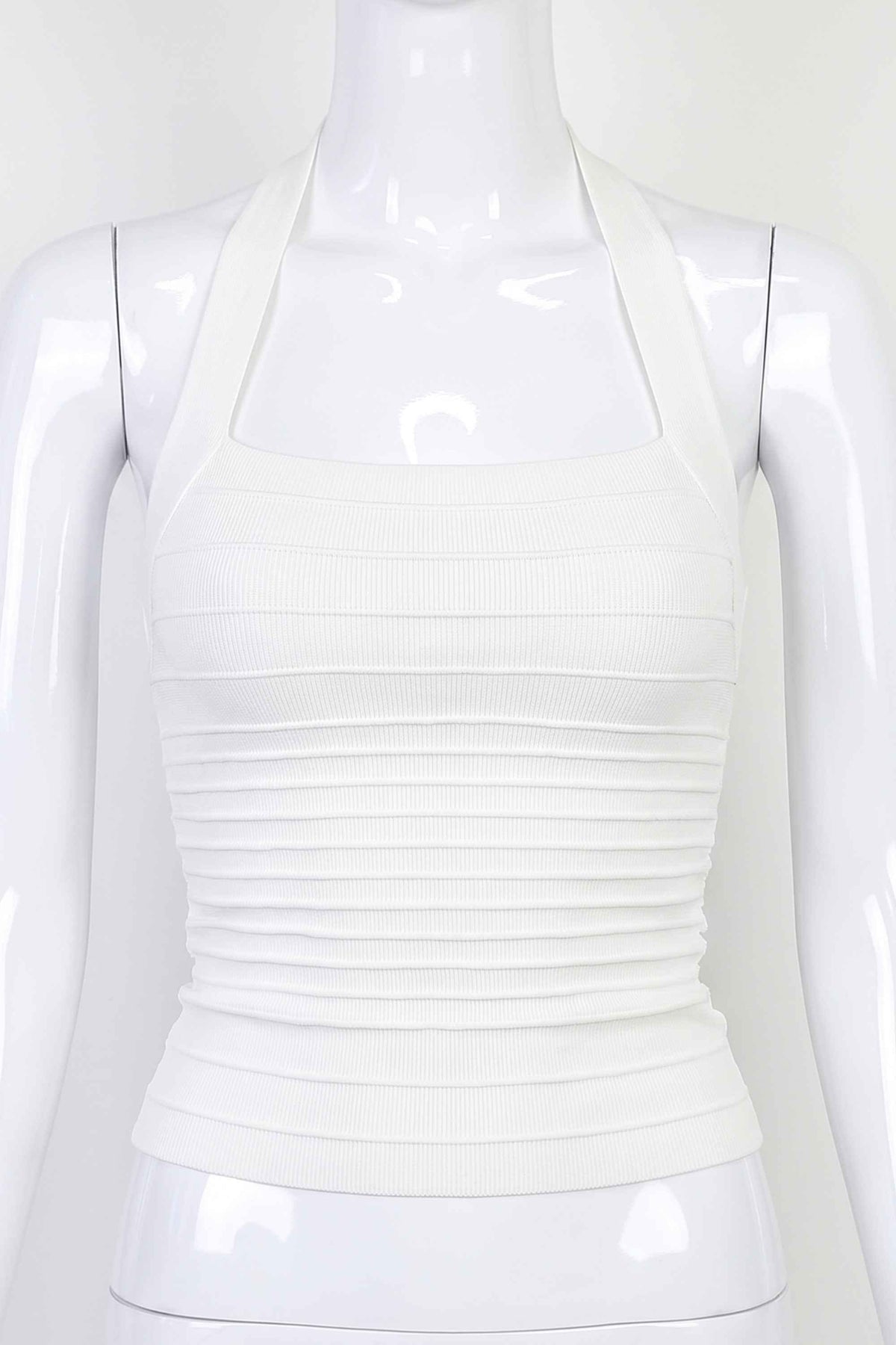 Woman wearing a figure flattering Kia Bandage Top - Pearl White BODYCON COLLECTION Pty Ltd