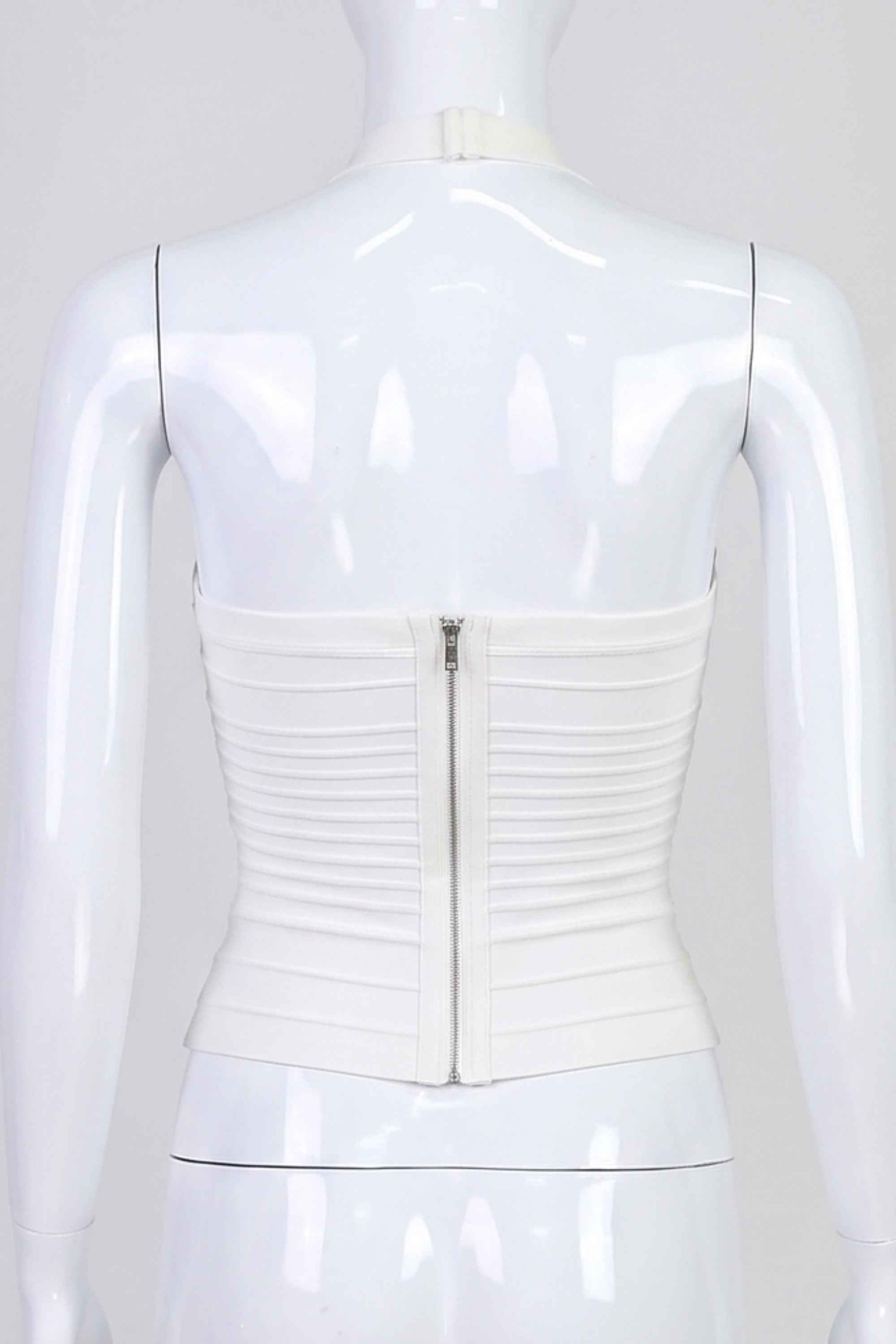 Woman wearing a figure flattering Kia Bandage Top - Pearl White BODYCON COLLECTION Pty Ltd