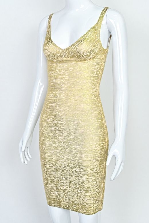 Woman wearing a figure flattering Kit Bandage Dress - Gold Bodycon Collection