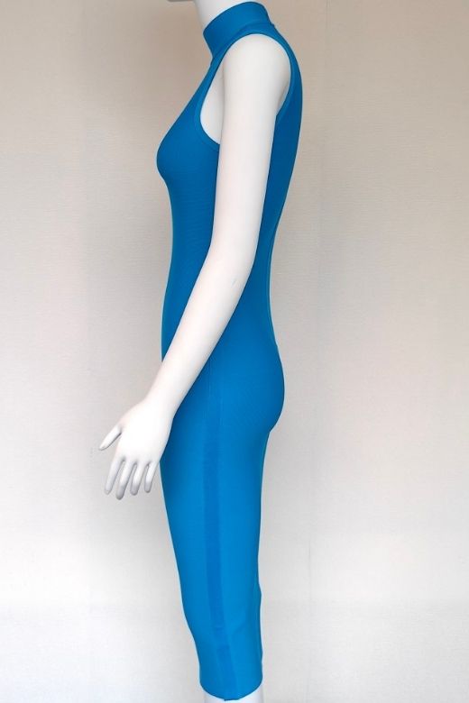 Woman wearing a figure flattering Layla Bandage Midi Dress - Sky Blue Bodycon Collection