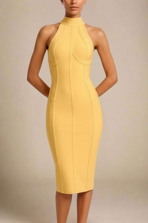 Woman wearing a figure flattering Lea Bandage Midi Dress - Mustard Yellow Bodycon Collection