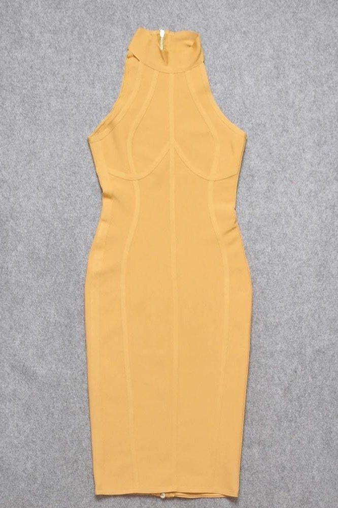 Woman wearing a figure flattering Lea Bandage Midi Dress - Mustard Yellow Bodycon Collection