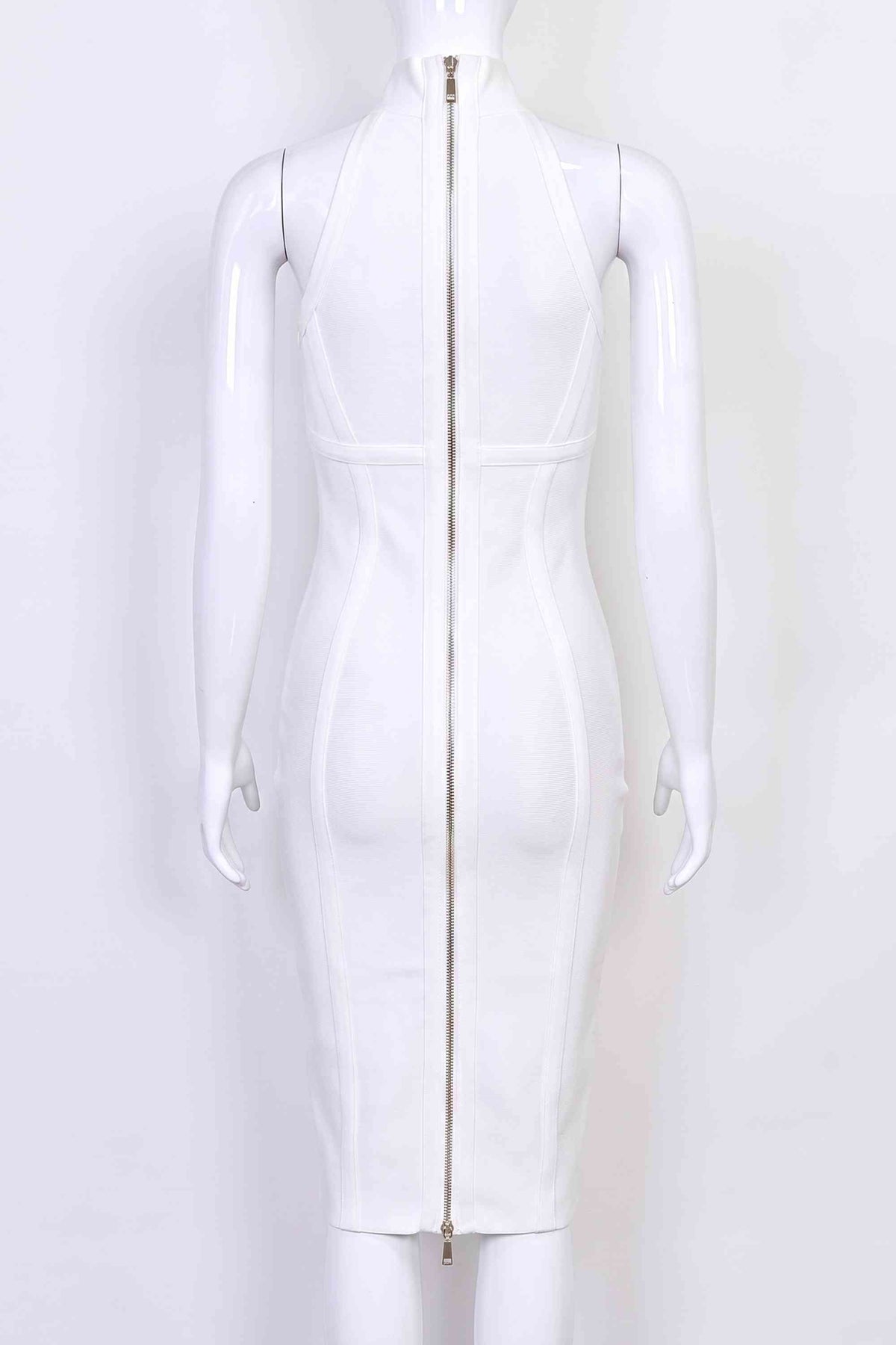 Woman wearing a figure flattering Lea Bandage Midi Dress - Pearl White Bodycon Collection
