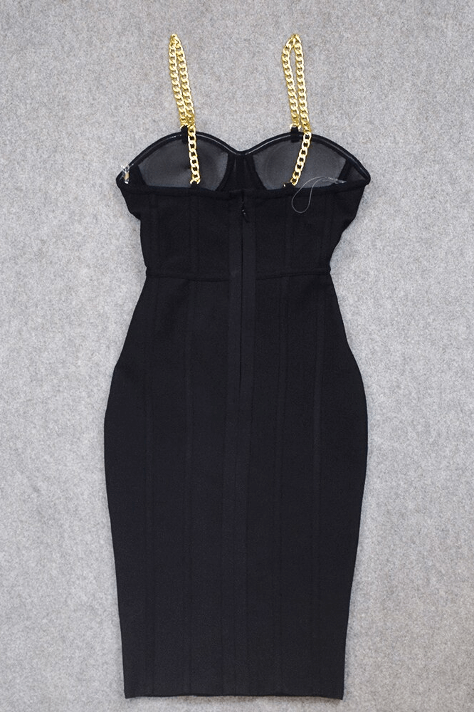 Woman wearing a figure flattering Leah Bodycon Dress - Classic Black Bodycon Collection