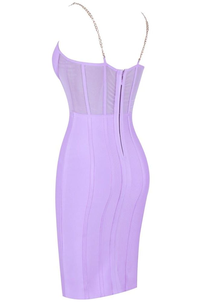 Woman wearing a figure flattering  Leah Bodycon Dress - Violet Bodycon Collection