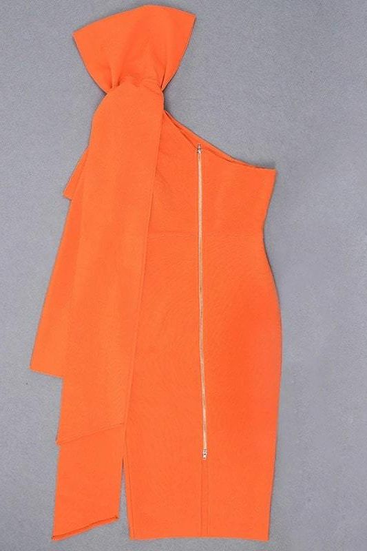 Woman wearing a figure flattering Lela Long Sleeve Bandage Midi Dress - Apricot Orange BODYCON COLLECTION