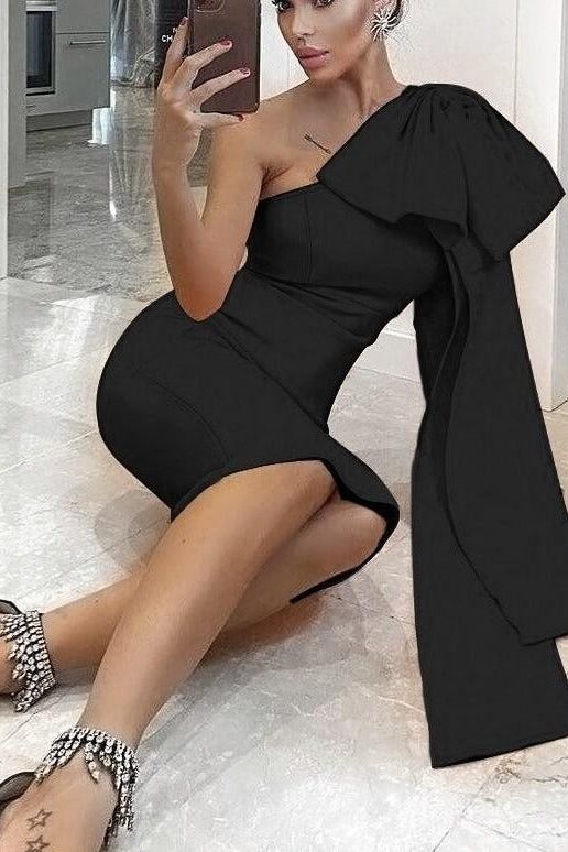 Woman wearing a figure flattering Lela Long Sleeve Bandage Midi Dress - Classic Black BODYCON COLLECTION