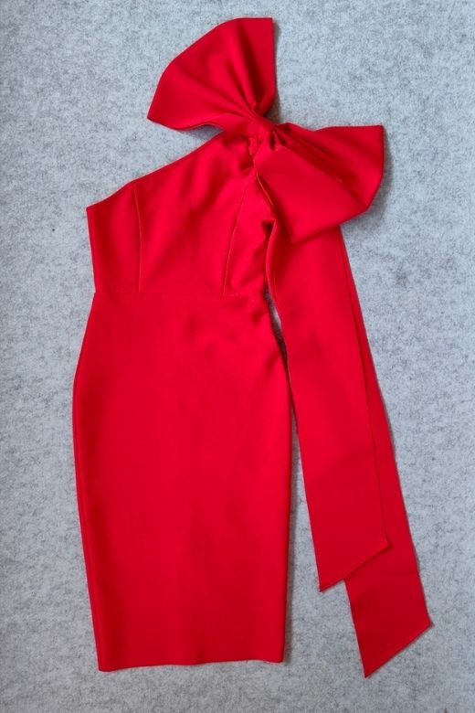 Woman wearing a figure flattering Lela Long Sleeve Bandage Midi Dress - Lipstick Red BODYCON COLLECTION