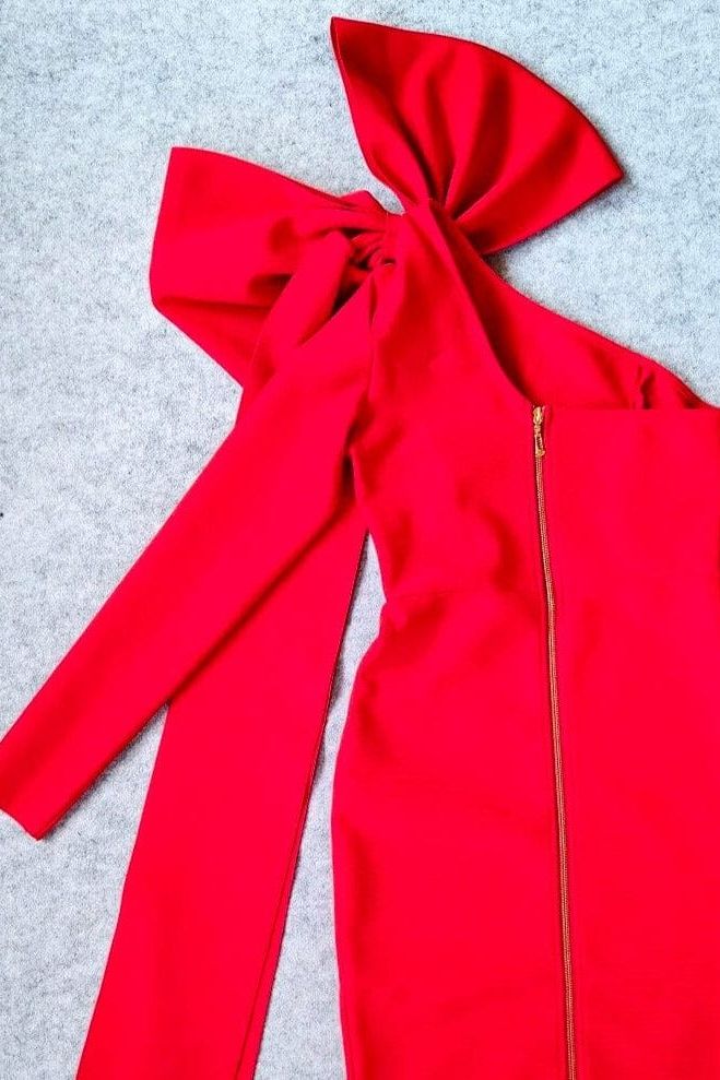 Woman wearing a figure flattering Lela Long Sleeve Bandage Midi Dress - Lipstick Red BODYCON COLLECTION