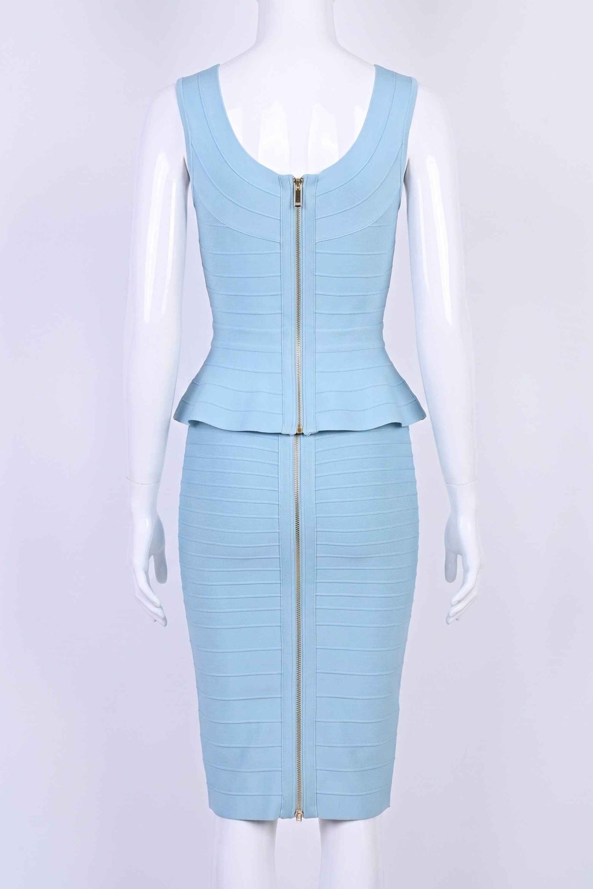 Woman wearing a figure flattering Leni Bandage Top and Knee Length Skirt Set - Sky Blue BODYCON COLLECTION