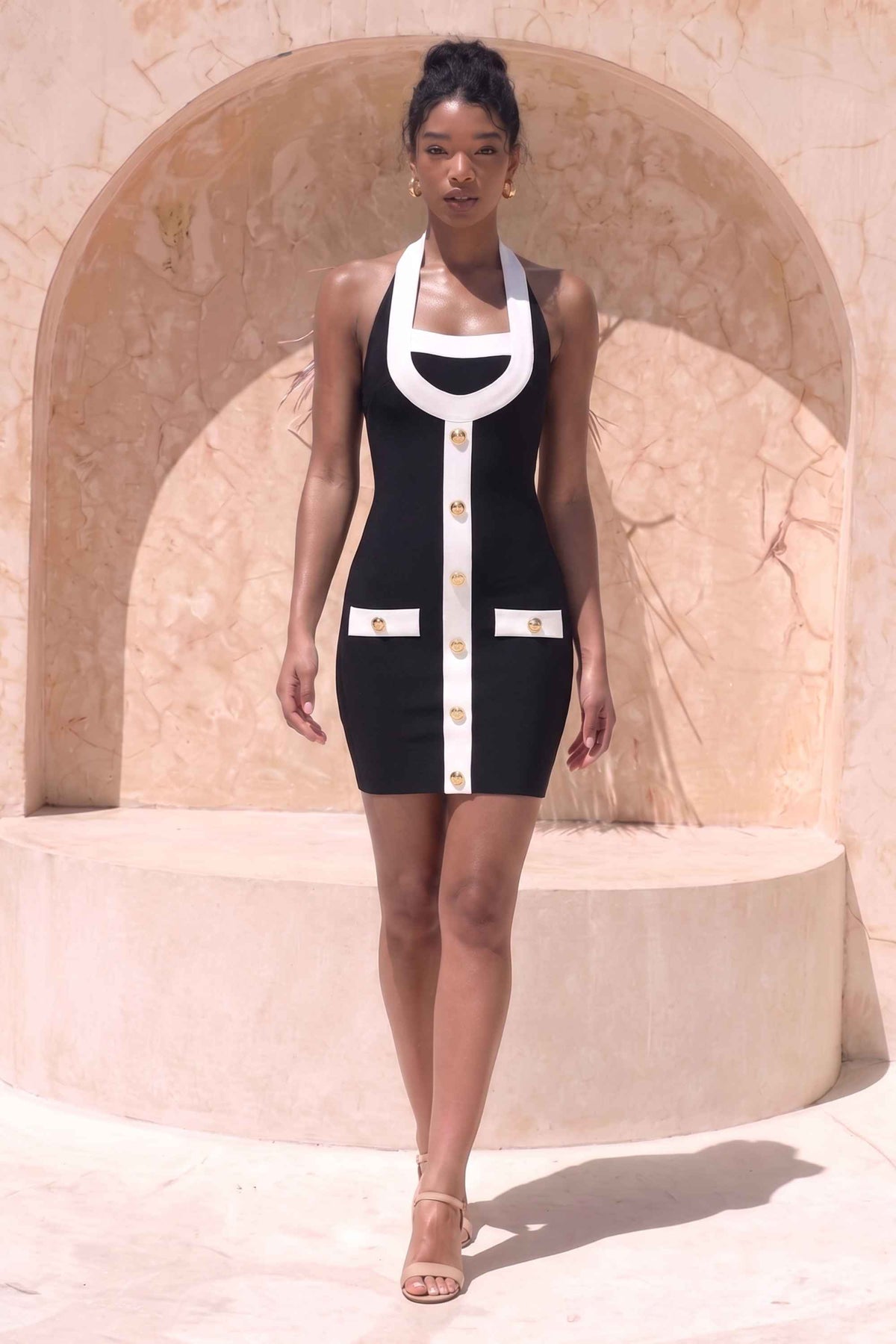 Woman wearing a figure flattering Leone Bandage Mini Dress - Classic Black BODYCON COLLECTION Pty Ltd