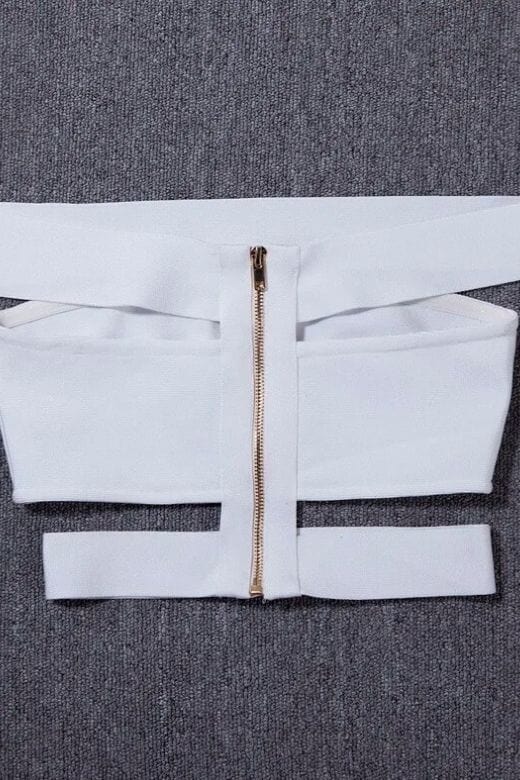 Woman wearing a figure flattering Lexia Bandage Crop Top - Pearl White BODYCON COLLECTION