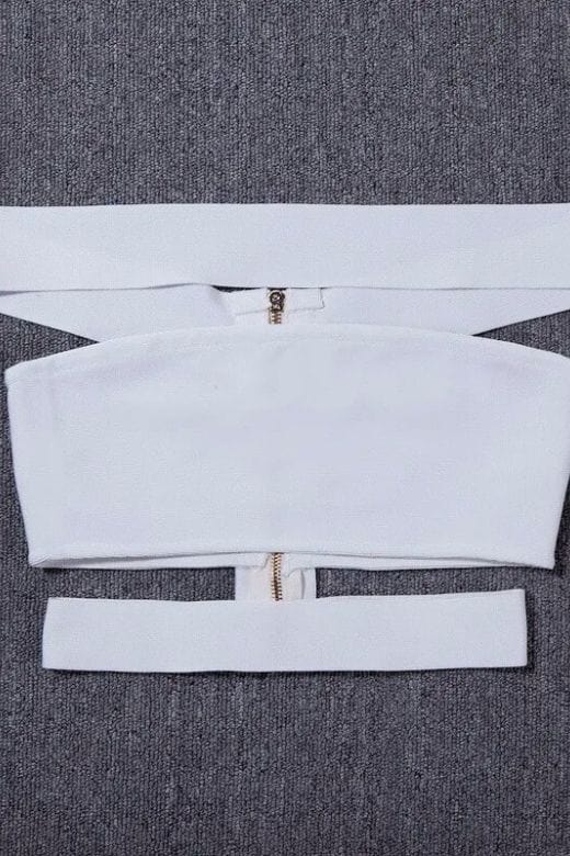Woman wearing a figure flattering Lexia Bandage Crop Top - Pearl White BODYCON COLLECTION