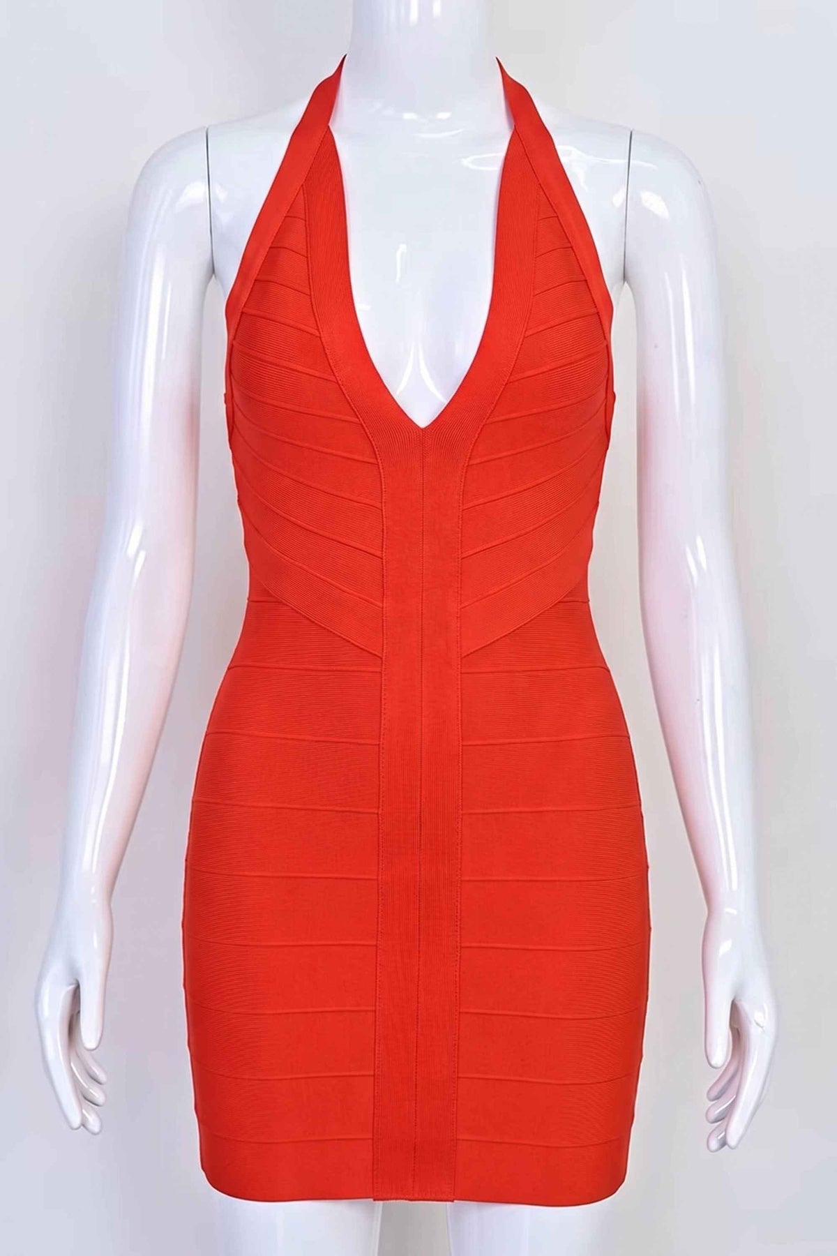 Woman wearing a figure flattering Lillian Bandage Mini Dress - Lipstick Red BODYCON COLLECTION Pty Ltd