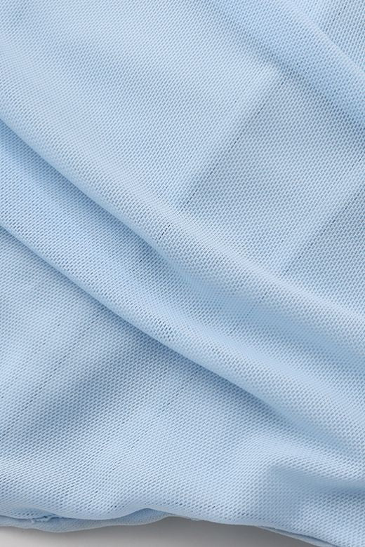 Woman wearing a figure flattering Margot Wrap Top and Maxi Skirt Outfit Set - Sky Blue BODYCON COLLECTION