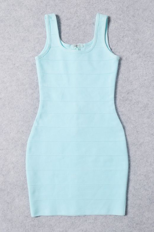 Woman wearing a figure flattering Maria Bandage Mini Dress - Baby Blue BODYCON COLLECTION