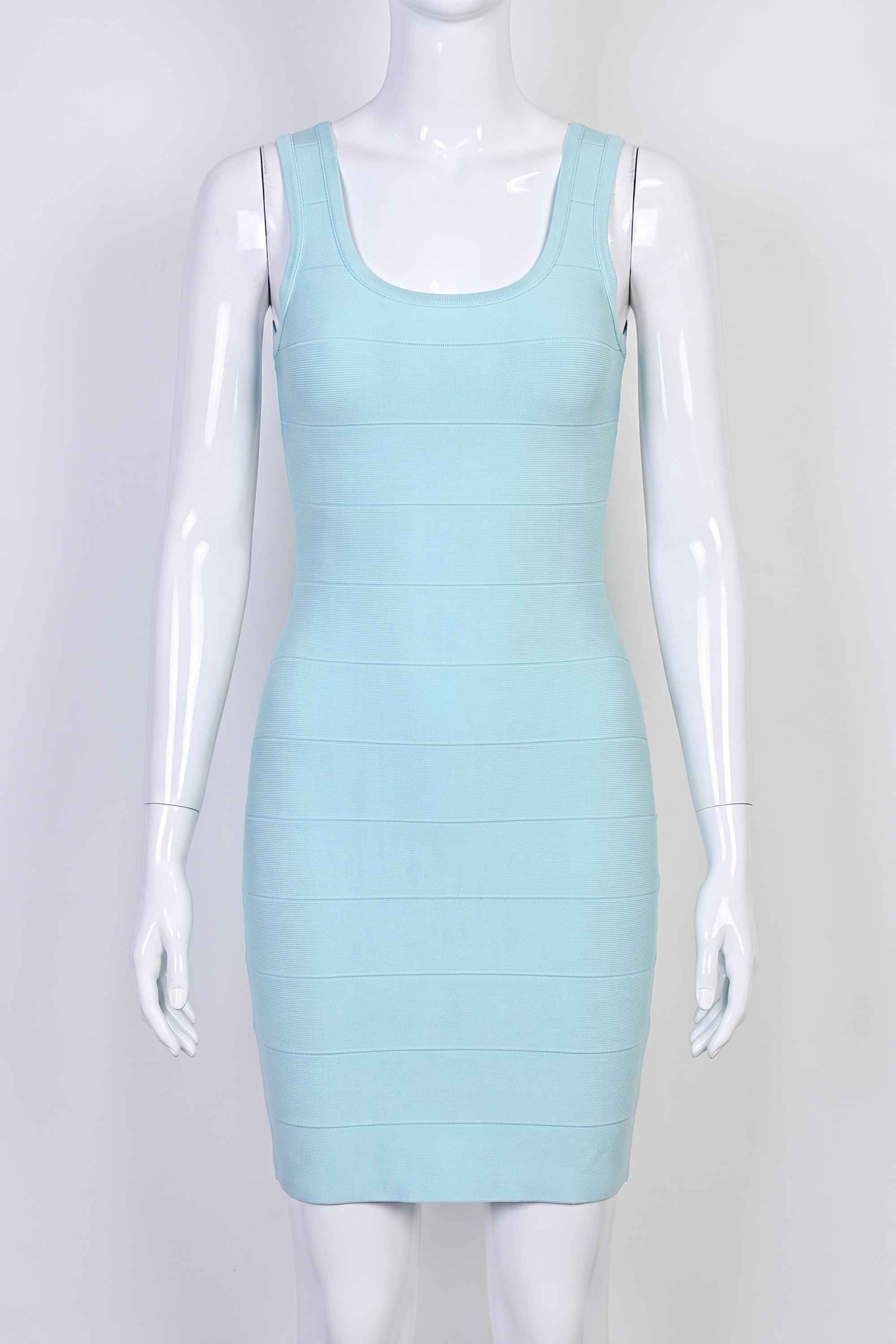 Woman wearing a figure flattering Maria Bandage Mini Dress - Baby Blue BODYCON COLLECTION