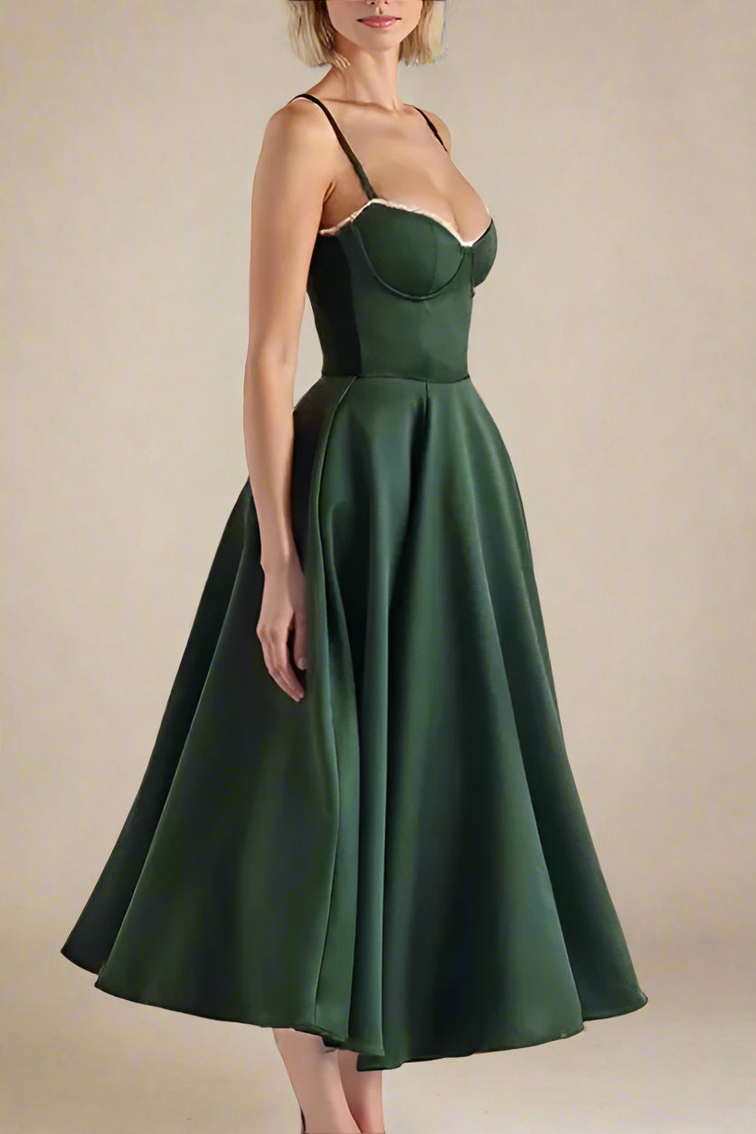 Woman wearing a figure flattering Mavis Bodycon Midi Dress - Emerald Green BODYCON COLLECTION