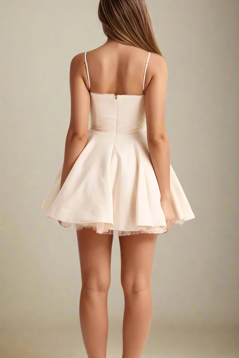 Woman wearing a figure flattering Mavis Bodycon Mini Dress - Cream BODYCON COLLECTION