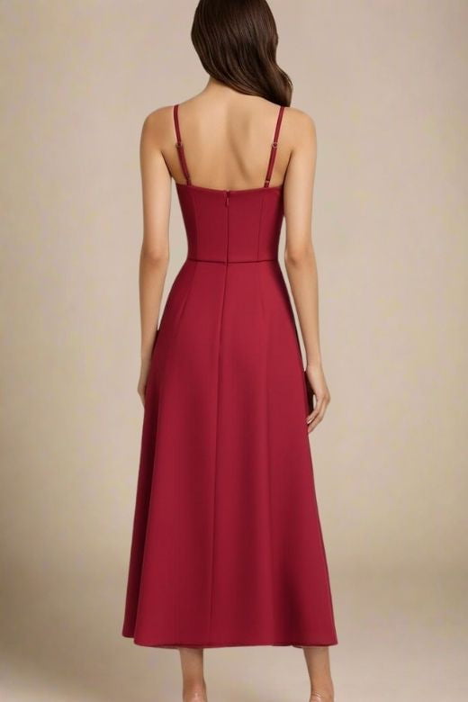 Woman wearing a figure flattering Mavis Midi Dress - Berry Red BODYCON COLLECTION