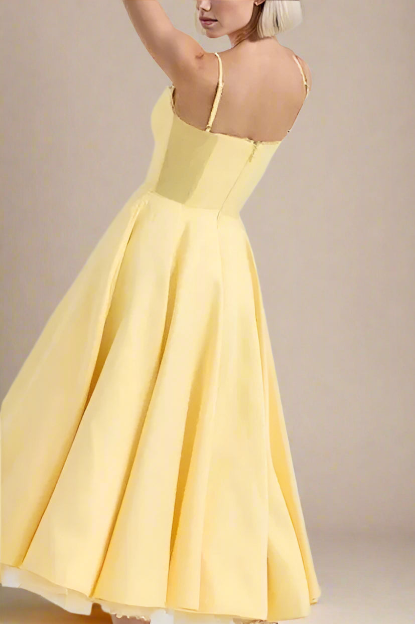Woman wearing a figure flattering Mavis Midi Dress - Sun Yellow BODYCON COLLECTION