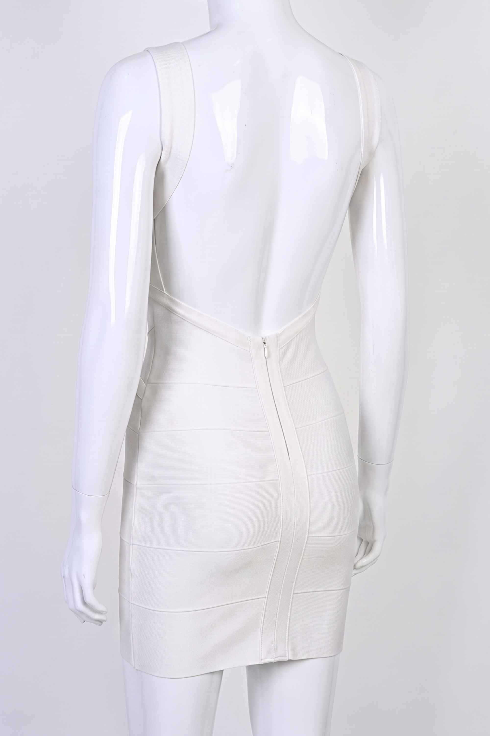 Woman wearing a figure flattering Maya Bandage Mini Dress - Pearl White BODYCON COLLECTION