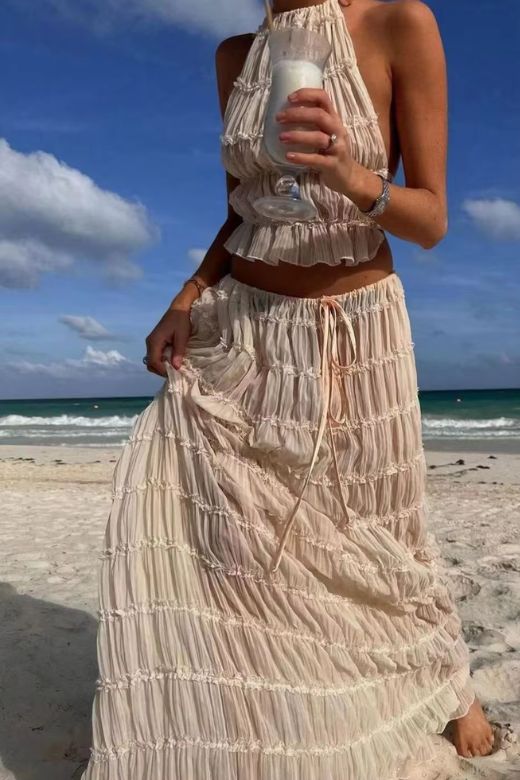 Woman wearing a figure flattering Meryl Wrap Top and Maxi Skirt Set - Butter Yellow BODYCON COLLECTION