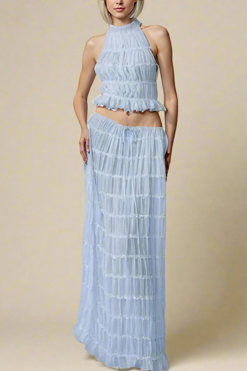 Woman wearing a figure flattering Meryl Wrap Top and Maxi Skirt Set - Sky Blue BODYCON COLLECTION