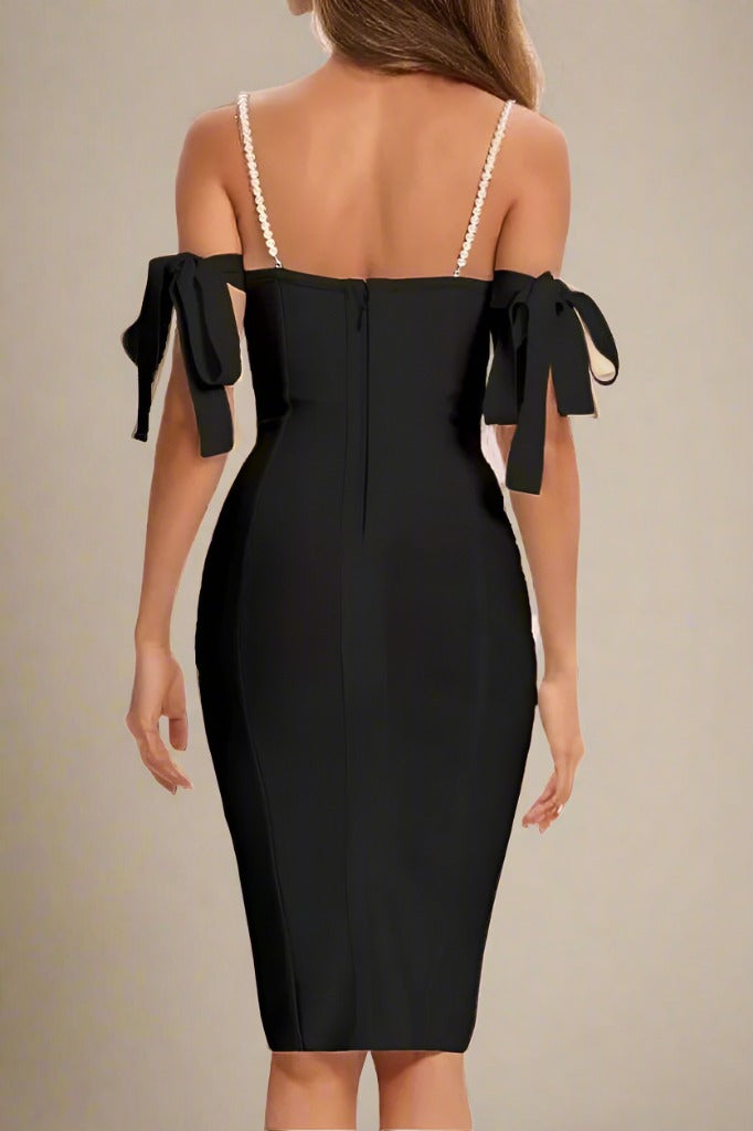 Woman wearing a figure flattering Mia Bandage Dress - Classic Black BODYCON COLLECTION