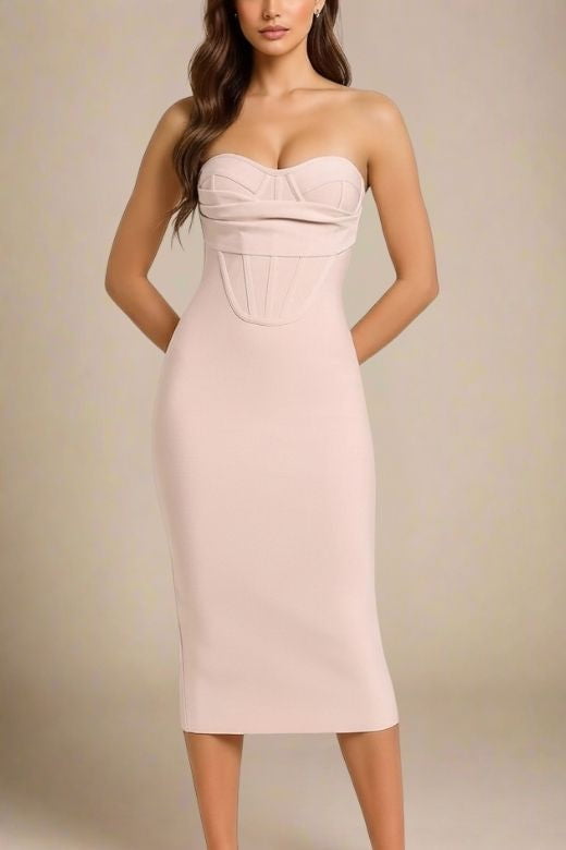Woman wearing a figure flattering Miles Bodycon Midi Dress - Nude BODYCON COLLECTION