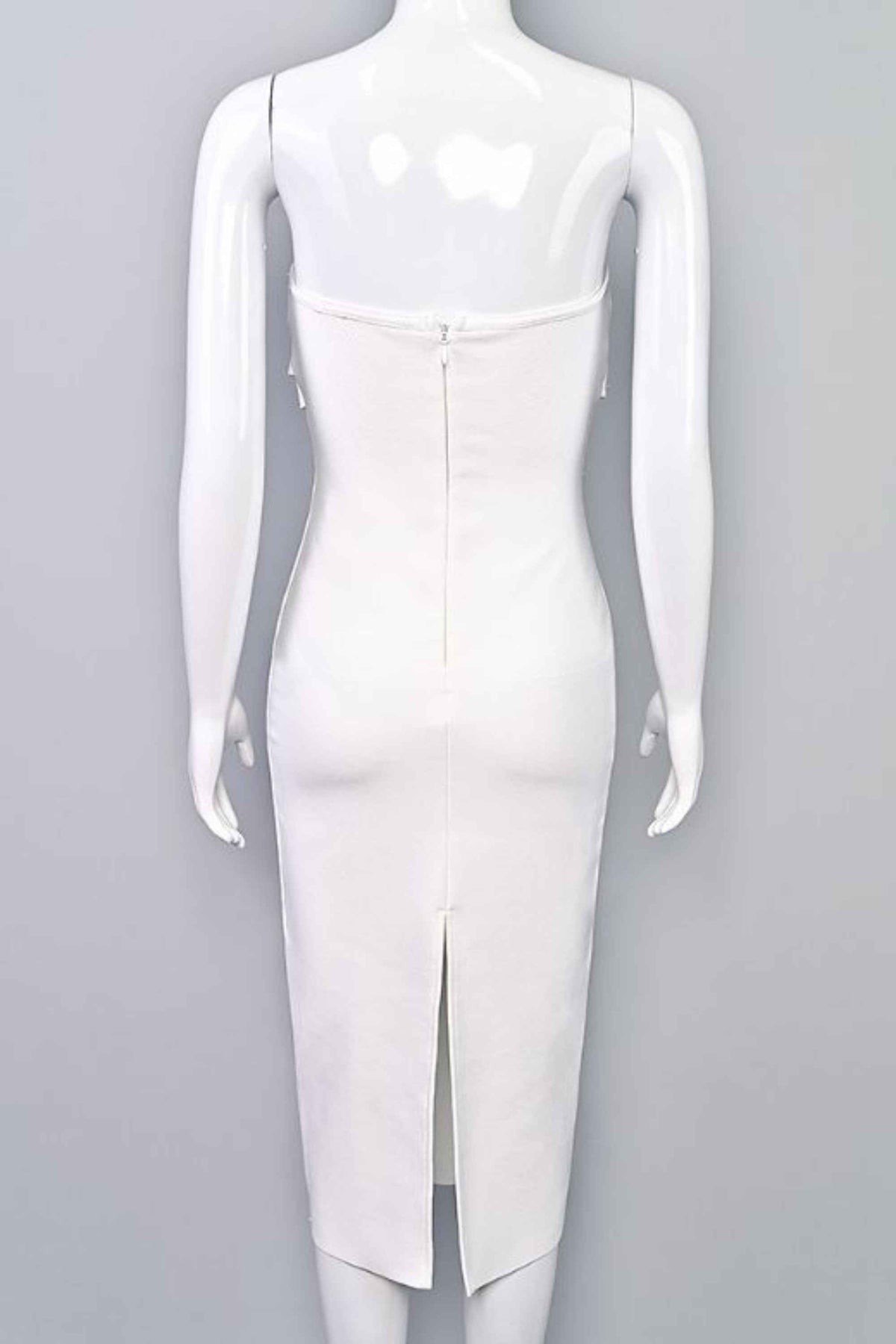 Woman wearing a figure flattering Miles Bodycon Midi Dress - Pearl White BODYCON COLLECTION