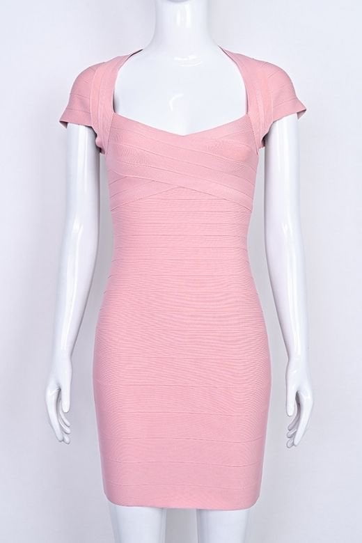 Woman wearing a figure flattering  Miranda Bandage Mini Dress - Ballet Pink Bodycon Collection