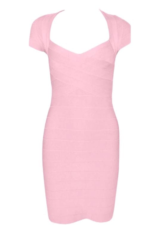 Woman wearing a figure flattering Miranda Bandage Mini Dress - Ballet Pink Bodycon Collection