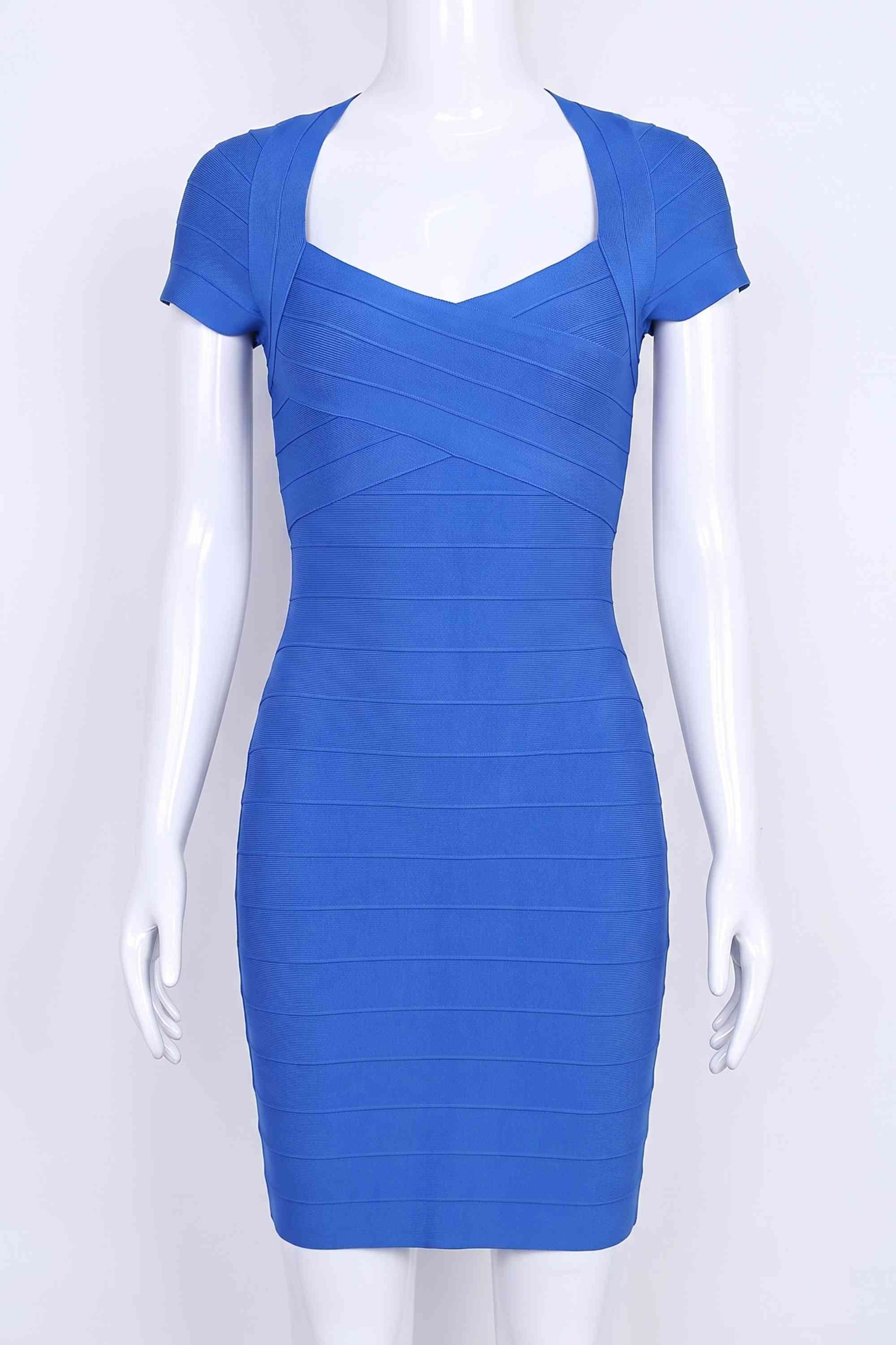 Woman wearing a figure flattering Miranda Bandage Mini Dress - Royal Blue Bodycon Collection
