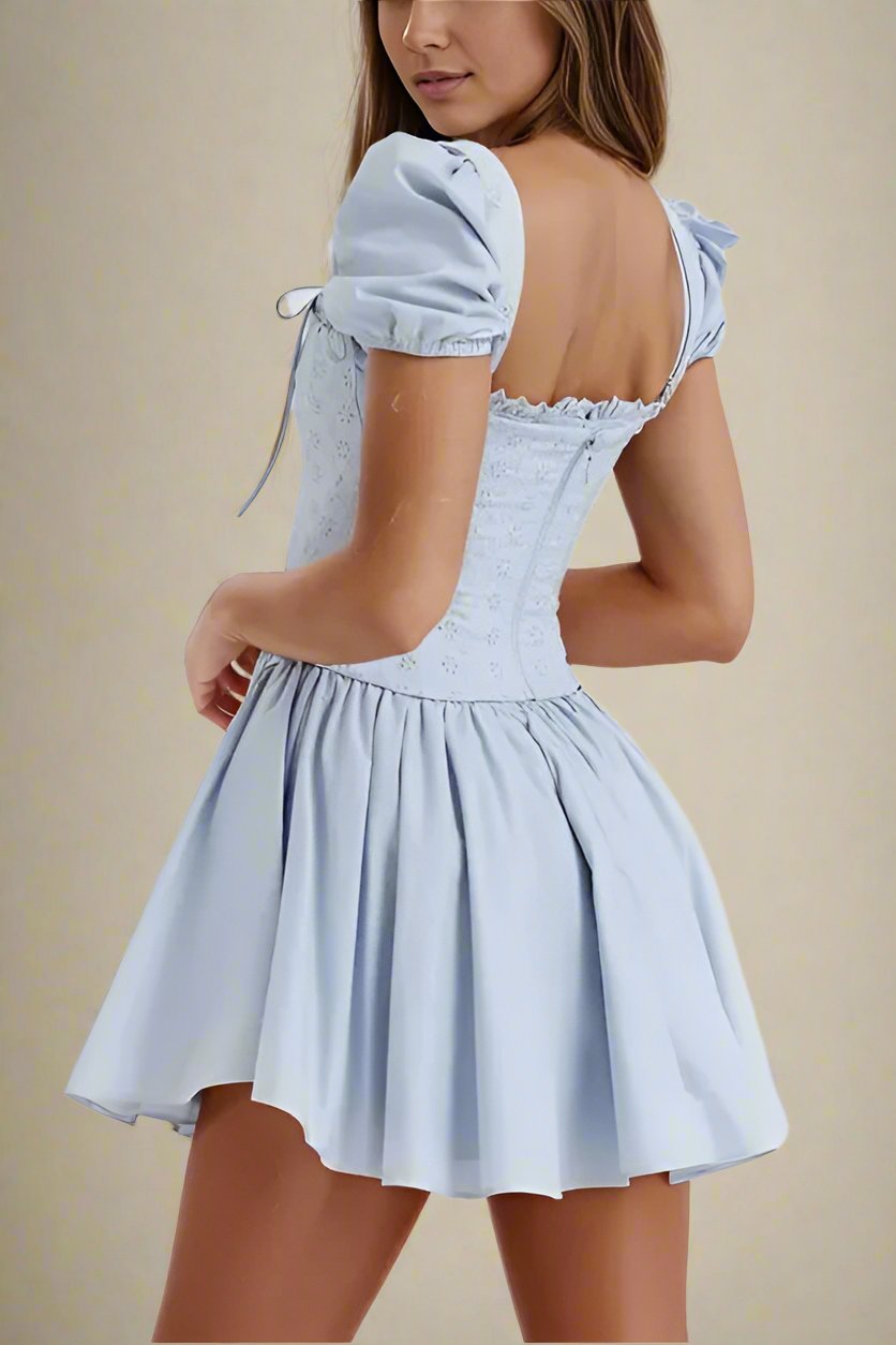 Woman wearing a figure flattering Misty Bodycon Mini Dress - Baby Blue BODYCON COLLECTION